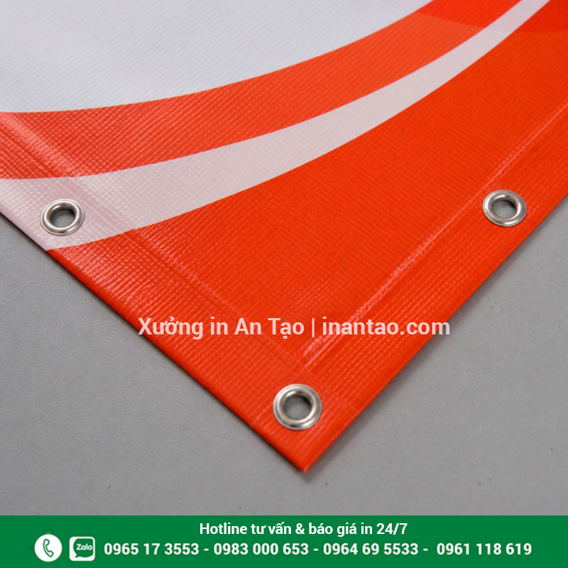 Đóng khoen chắc chắn cho banner Hiflex Gia công đóng khoen và gấp biên sau khi in banner