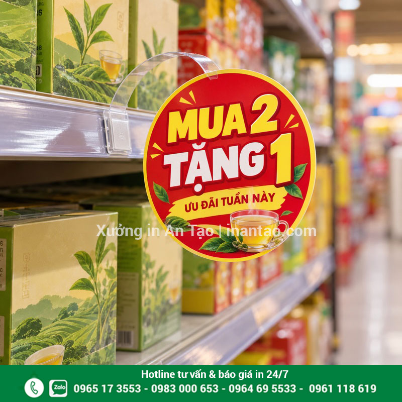 Mẫu bảng khuyến mãi mua 2 tặng 1 tại kệ siêu thị Wobbler siêu thị hình tròn in mua 2 tặng 1 gắn cạnh các hộp trà